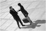 Business people shaking hands.